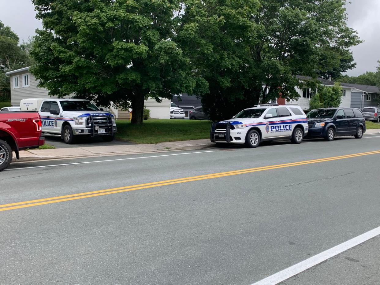 A 65-year-old woman was found dead inside this home on Smallwood Drive in Mount Pearl. Police believe she was murdered by a 14-year-old boy, but haven't released any details on their relationship or possible motive. (Ted Dillon/CBC - image credit)