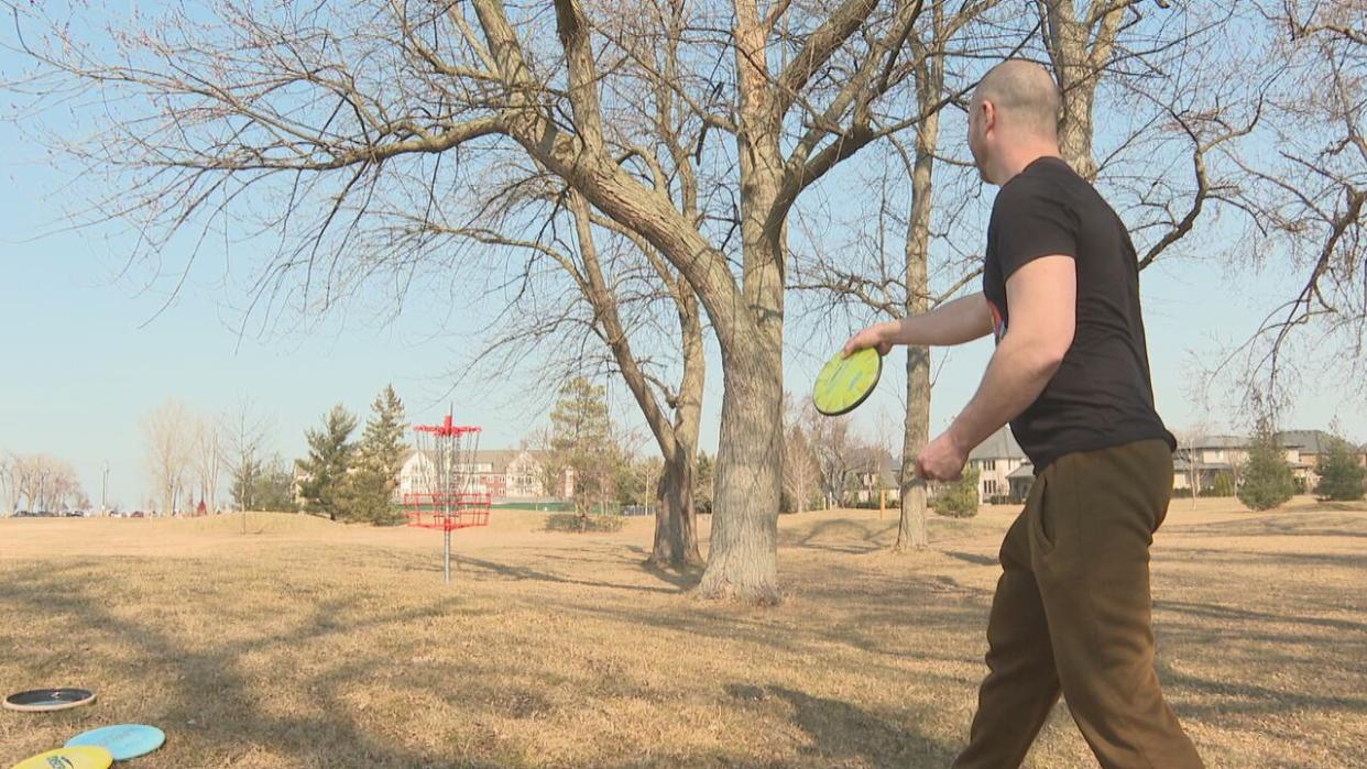 Matt Haskell, who was playing disc golf in Lakewood Park, said being able to take his sweater off felt 