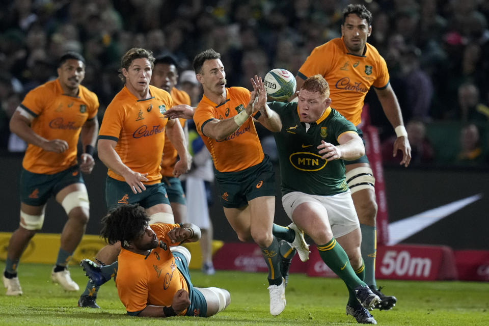 South Africa's Steven Kisthoff, right, challenges Australia's Nic White centre, during the Rugby Championship test match between South Africa and Australia at Loftus Versfeld stadium in Pretoria, South Africa, Saturday, July 8, 2023. (AP Photo/Themba Hadebe)