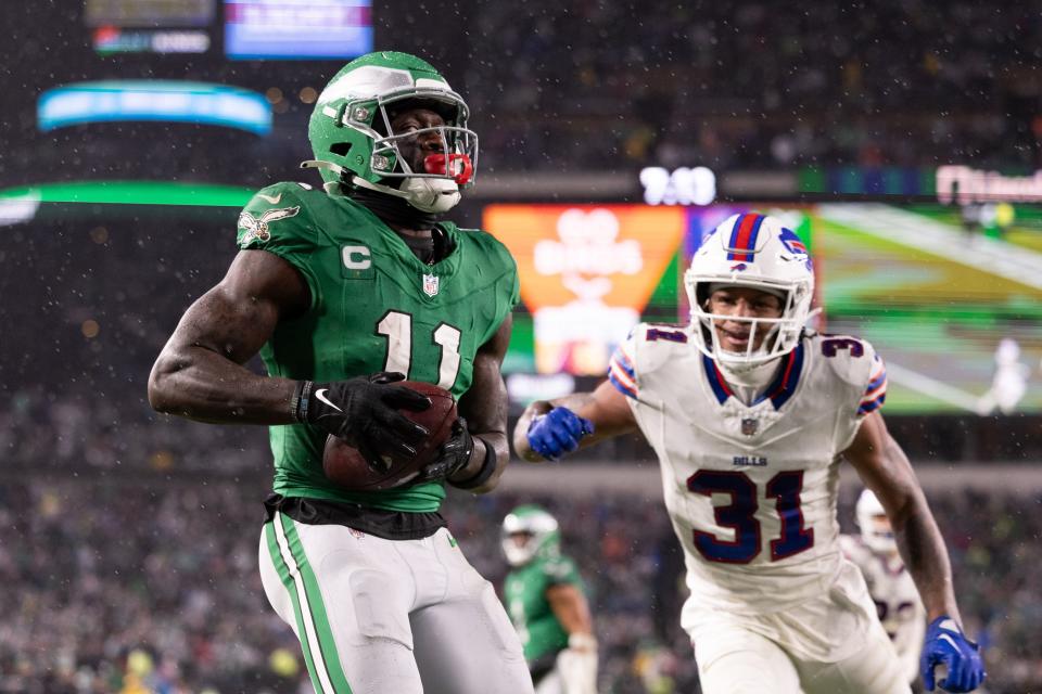 Nov 26, 2023; Philadelphia, Pennsylvania, USA; Philadelphia Eagles wide receiver A.J. Brown (11) makes a touchdown catch in front of <a class="link " href="https://sports.yahoo.com/nfl/teams/buffalo/" data-i13n="sec:content-canvas;subsec:anchor_text;elm:context_link" data-ylk="slk:Buffalo Bills;sec:content-canvas;subsec:anchor_text;elm:context_link;itc:0">Buffalo Bills</a> cornerback <a class="link " href="https://sports.yahoo.com/nfl/players/30212/" data-i13n="sec:content-canvas;subsec:anchor_text;elm:context_link" data-ylk="slk:Rasul Douglas;sec:content-canvas;subsec:anchor_text;elm:context_link;itc:0">Rasul Douglas</a> (31) during the third quarter at Lincoln Financial Field. Mandatory Credit: Bill Streicher-USA TODAY Sports