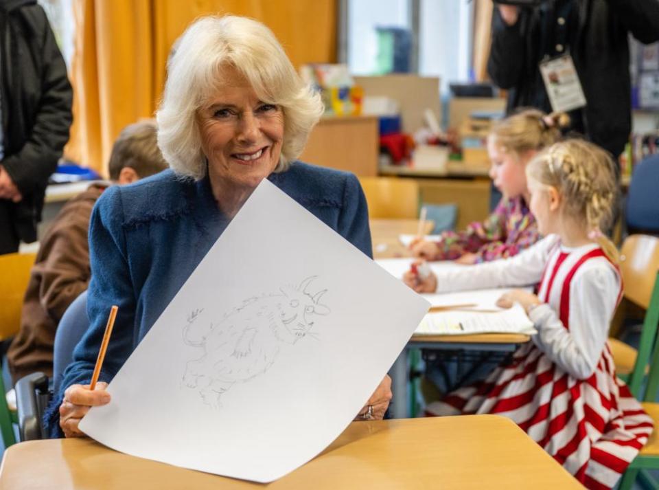 Camilla shows off her drawing of the Gruffalo.