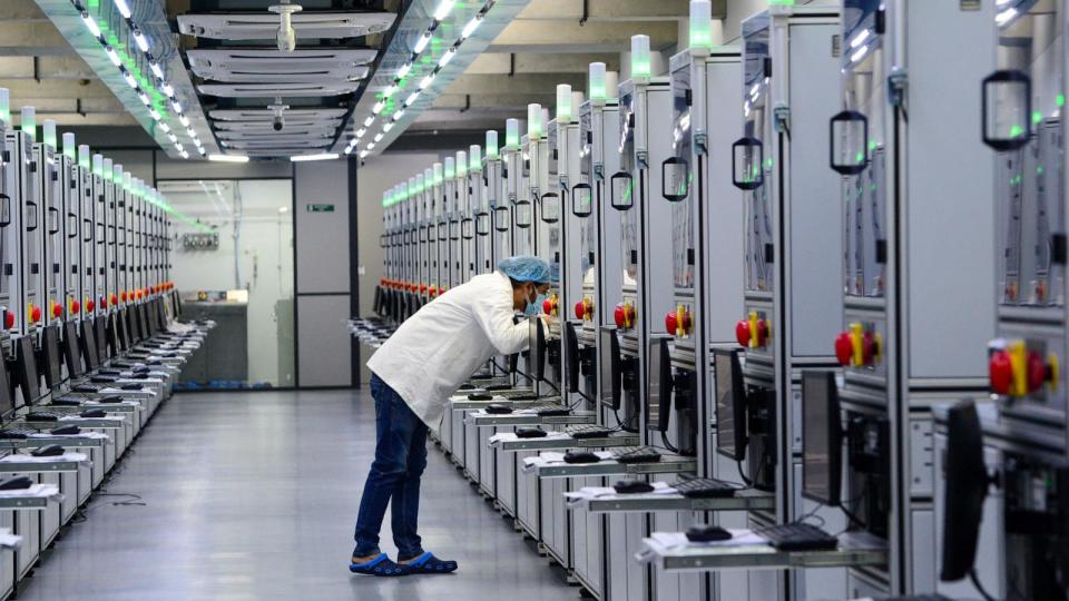 PHOTO: This photograph taken February 6, 2024 shows a laboratory technician monitoring the progress of lab-grown diamond seeds at Greenlab Diamonds manufacturing firm on the outskirts of Surat. (Sam Panthaky/AFP via Getty Images)