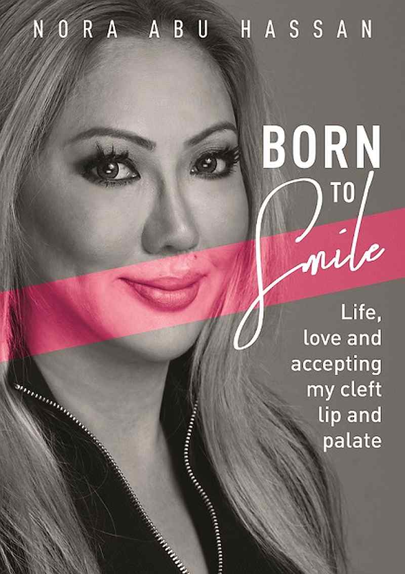 ‘Born to Smile’ is a raw account that deals with bullying, self-acceptance and normalising the birth condition that affects one in 800 babies. — Picture courtesy of Nora Abu Hassan