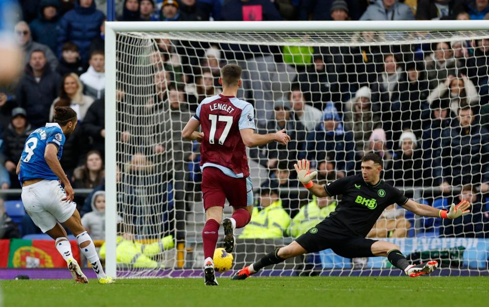 Aston Villa's Emiliano Martinez saves from Everton's Dominic Calvert-Lewin