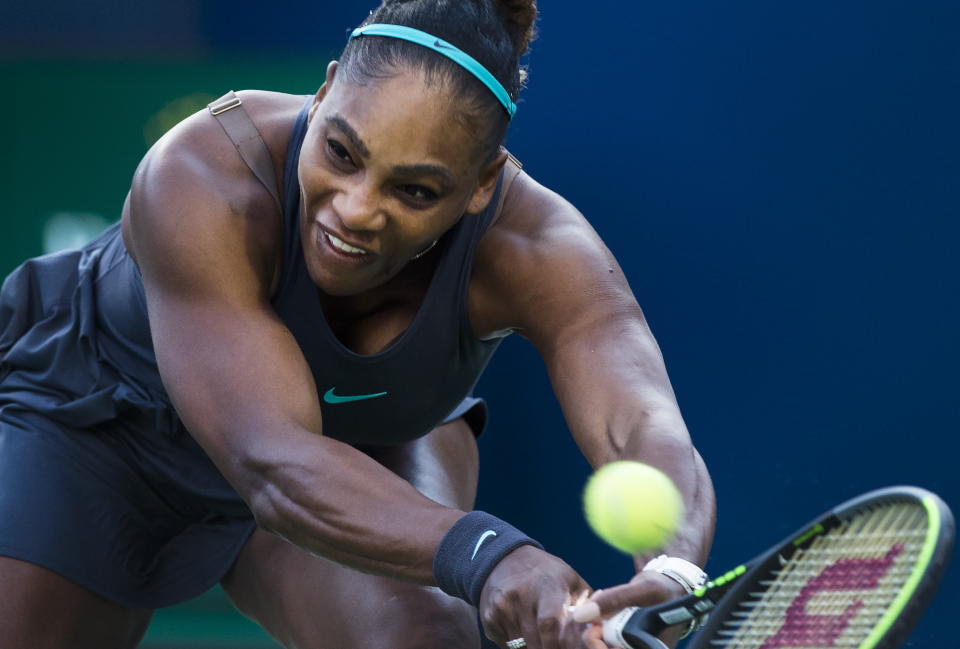 Serena Williams, of the United States, reaches for a shot from Naomi Osaka, of Japan, during the Rogers Cup women’s tennis tournament Friday, Aug. 9, 2019, in Toronto. (Nathan Denette/The Canadian Press via AP)