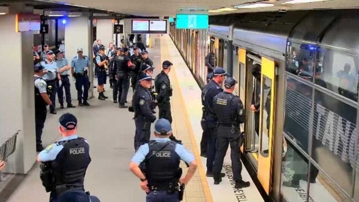 Men dressed in black who were detained at North Sydney Station on Australia Day. Picture: Supplied.