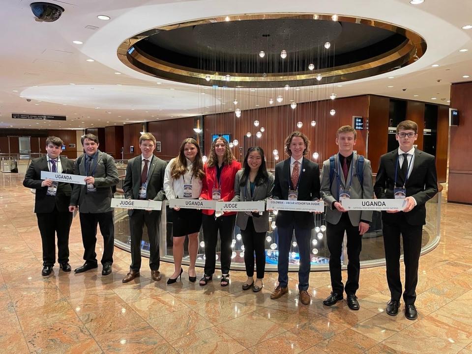 (From left) Cody Allen, Carter Black, Connor Hayes, Maria Ionno, Vivian Chute, Sabrina Li, Tyler Schmied, Harvey Pierce and Devin Yeager are members of the Model United Nations team at Grandview Heights High School. They're standing in the lobby of the New York Hilton Midtown, where they won Award of Distinction, the top award, for research and preparation and the Award of Merit, a third-place honor, for committee performance at the National High School Model United Nations Conference.