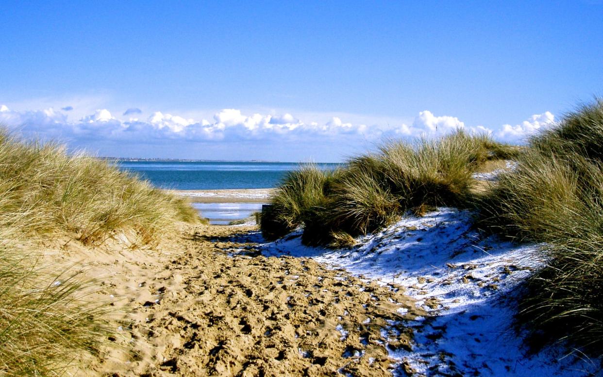 A bit of snow on the beach never hurt anyone - istock