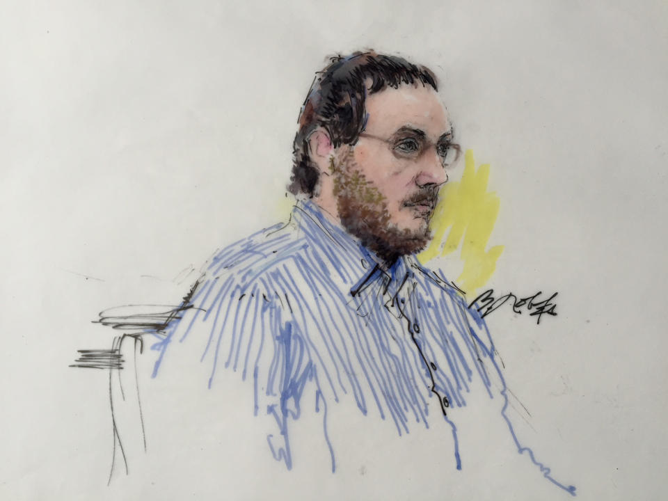 James Holmes sits in Arapahoe County District Court in Denver, Colorado on February 11, 2015, in this courtroom sketch. Lawyers in the murder trial of Colorado theater gunman Holmes are set to begin individual questioning of prospective jurors in the death-penalty case on Wednesday, a process scheduled to take four months to complete. (REUTERS/Bill Robles)