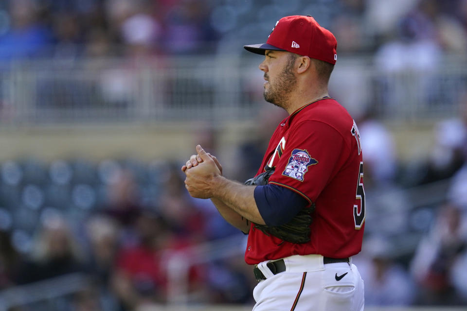 Minnesota Twins relief pitcher Caleb Thielbar reacts during the eighth inning of a baseball game against the Chicago White Sox, Thursday, Sept. 29, 2022, in Minneapolis. (AP Photo/Abbie Parr)