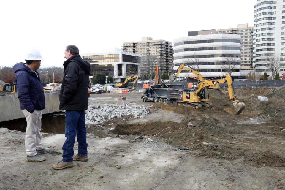 Construction crews at work for Hamilton Green, the new housing development by RXR and the Cappelli Organization, on the former White Plains Mall site Dec. 8, 2022 in White Plains. The residential project will include four mixed-income multifamily buildings totaling 860 rental units, including 78 on-site affordable units, open space, underground parking, as well as dining, retail and commercial spaces.