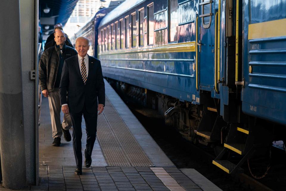 President Joe Biden walks along the train platform after a surprise visit to meet with Ukrainian President Volodymyr Zelenskyy.