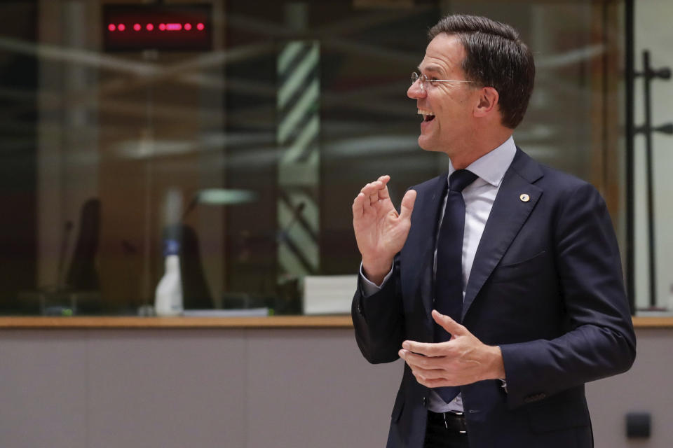 Dutch Prime Minister Mark Rutte smiles during a round table meeting at an EU summit in Brussels, Tuesday, July 21, 2020. Weary European Union leaders are expressing cautious optimism that a deal is in sight as they moved into their fifth day of wrangling over an unprecedented budget and coronavirus recovery fund. (Stephanie Lecocq, Pool Photo via AP)