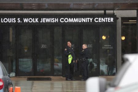 Police search a Jewish Community Center after a bomb threat was reported in the Rochester suburb of Brighton, New York, U.S., March 7, 2017. REUTERS/Mike Bradley