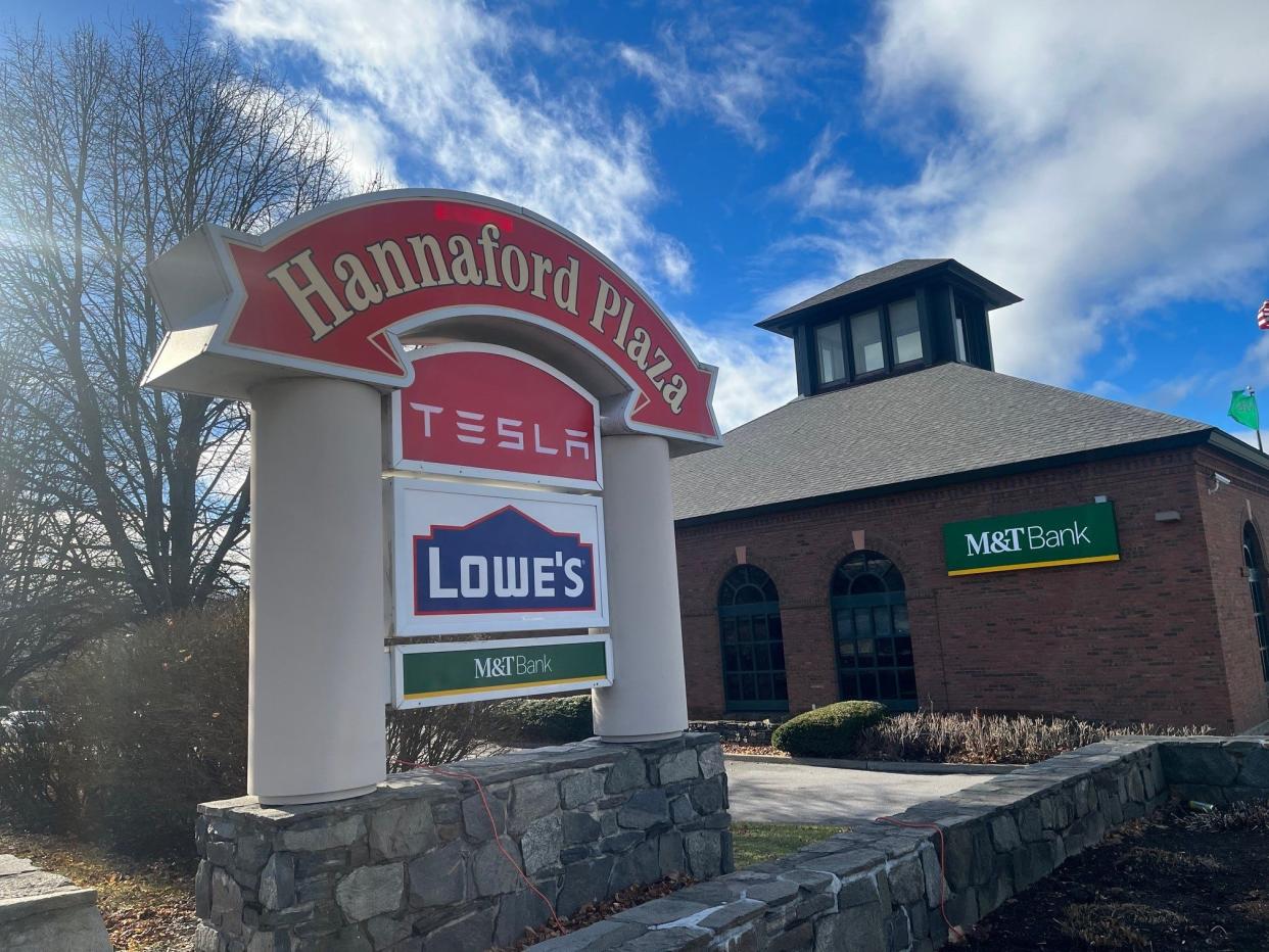 Tesla tops the sign on Shelburne Road for Hannaford Plaza in South Burlington, as seen on Dec. 19, 2023.