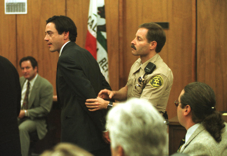 317855 01: FILE PHOTO: Actor Robert Downey Jr. is taken into custody after being charged with possession of cocaine and speed following a judge's decision inside a Malibu courtroom December 8, 1997 in Malibu, CA. Three years later, at about the same time of the month, a source close to the actor said December 5, 2000 that Robert Downey Jr. faces a court hearing later this month on felony drug charges and was hospitalized over the weekend for treatment of depression. (Photo by John T. Barr/Liaison)