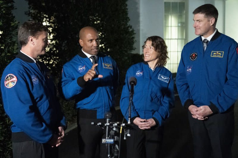 Artemis II crew members Reid Wiseman (L), Victor Glover (2nd L), Christina Hammock Koch (2nd R), and Jeremy Hansen (R) take turns speaking to the media outside the White House in Washington, D.C., after meeting with President Joe Biden on December 14, 2023. The crew's Artemis II mission is being pushed back from later this year to September 2025, NASA announced Tuesday. Photo by Chris Kleponis/UPI