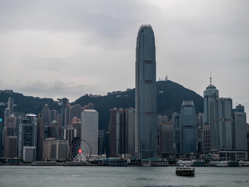 A Star Ferry ship sails in Victoria Harbour in front of the Hong Kong Skyline on October 17, 2022 in Hong Kong, China.