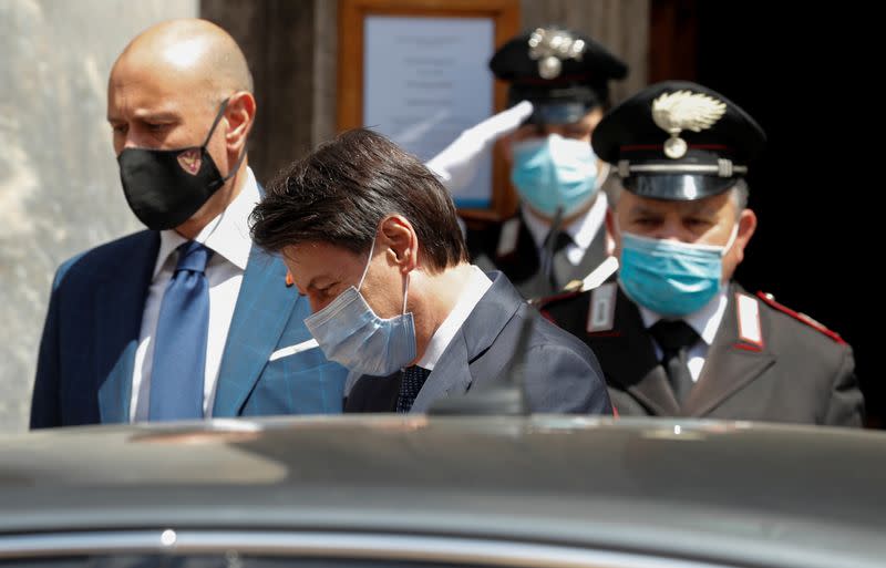 Italian Prime Minister Giuseppe Conte wearing a protective face mask, leaves the Senate as the spread of the coronavirus disease (COVID-19) continues, in Rome