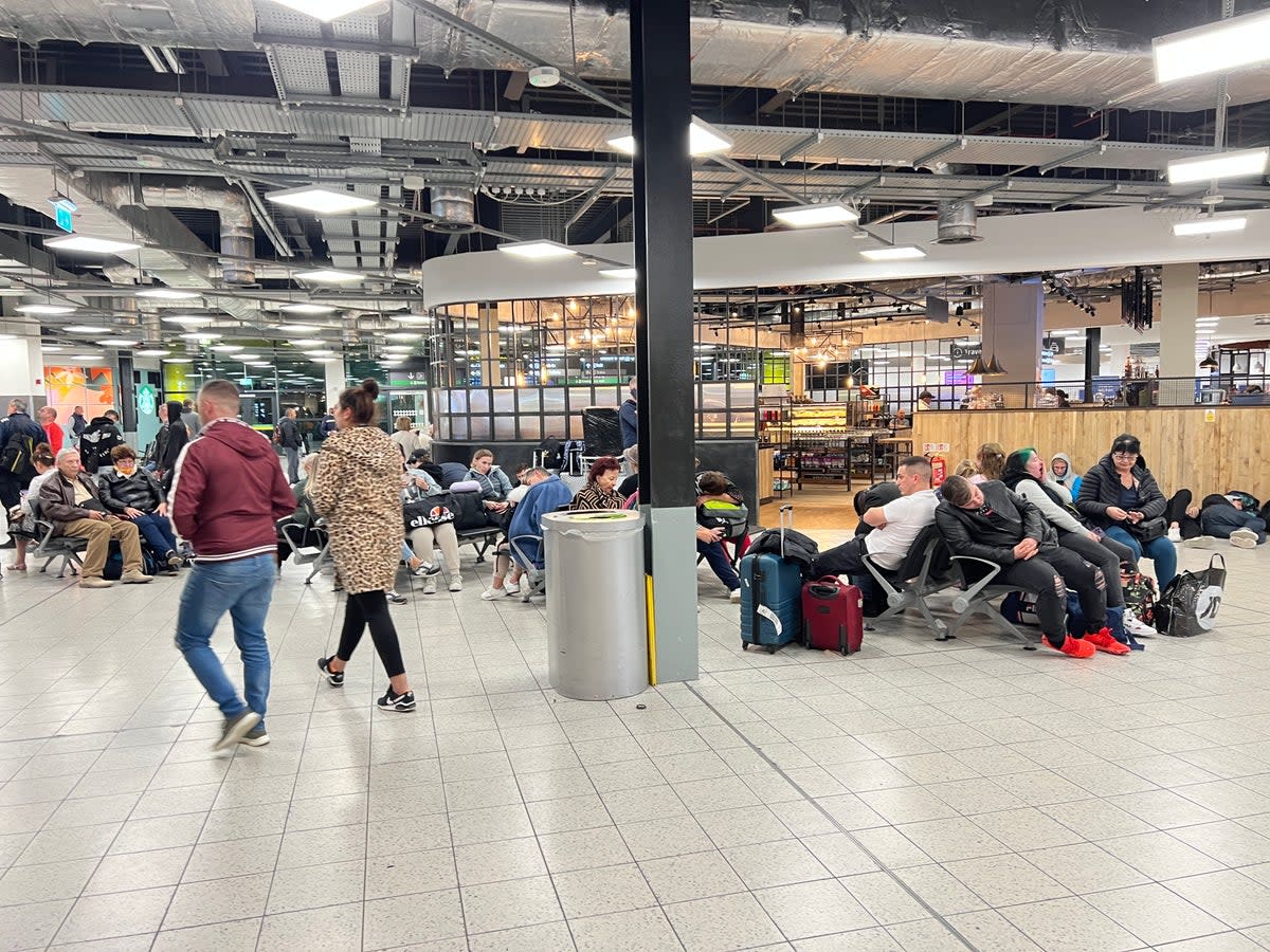Passengers wait at Luton Airport after flights cancelled until Wednesday afternoon (Simon Calder)