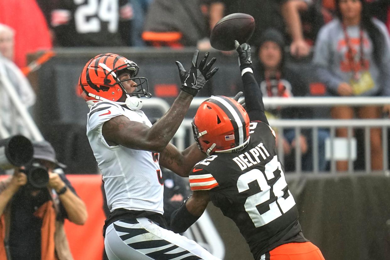 Browns safety Grant Delpit (22) breaks up a pass intended for Bengals wide receiver Tee Higgins during the second half, Sunday, Sept. 10, 2023, in Cleveland.