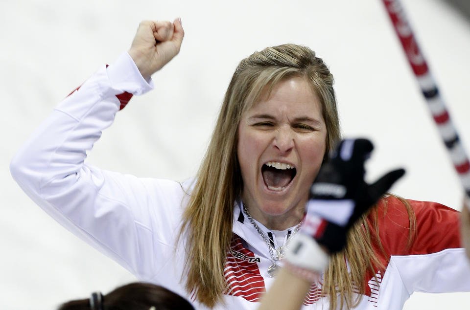 Canada’s skip Jennifer Jones celebrates after delivering the last rock during the women's curling semifinal game victory over Britain at the 2014 Winter Olympics, Wednesday, Feb. 19, 2014, in Sochi, Russia. (AP Photo/Robert F. Bukaty)