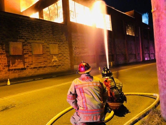 Newark Fire and other departments respond to a blaze at Newark Station on West Main Street early Easter Sunday morning April 17, 2022.