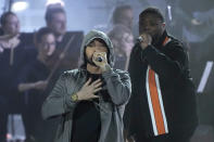 Eminem performs with Mr. Porter during "Live From Detroit: The Concert at Michigan Central" on Thursday, June 6, 2024, in Detroit. (AP Photo/Carlos Osorio)