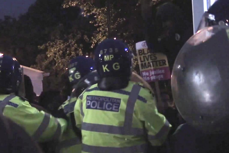 Forest Gate: Riot police tried to contain crowds as the protest descended into chaos