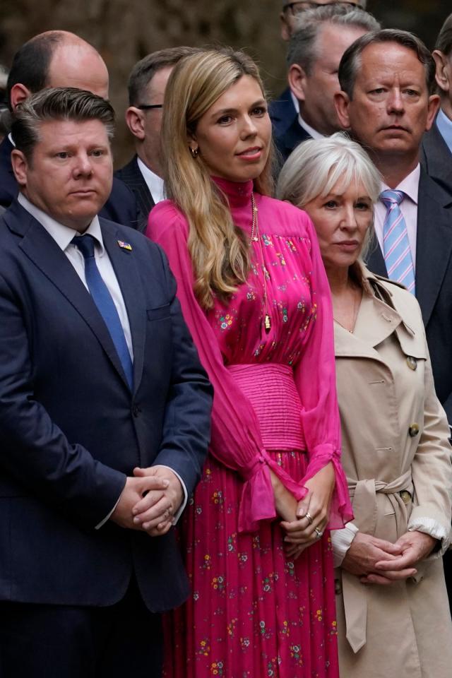 Carrie Johnson departs No10 in a billowing boho pink dress from