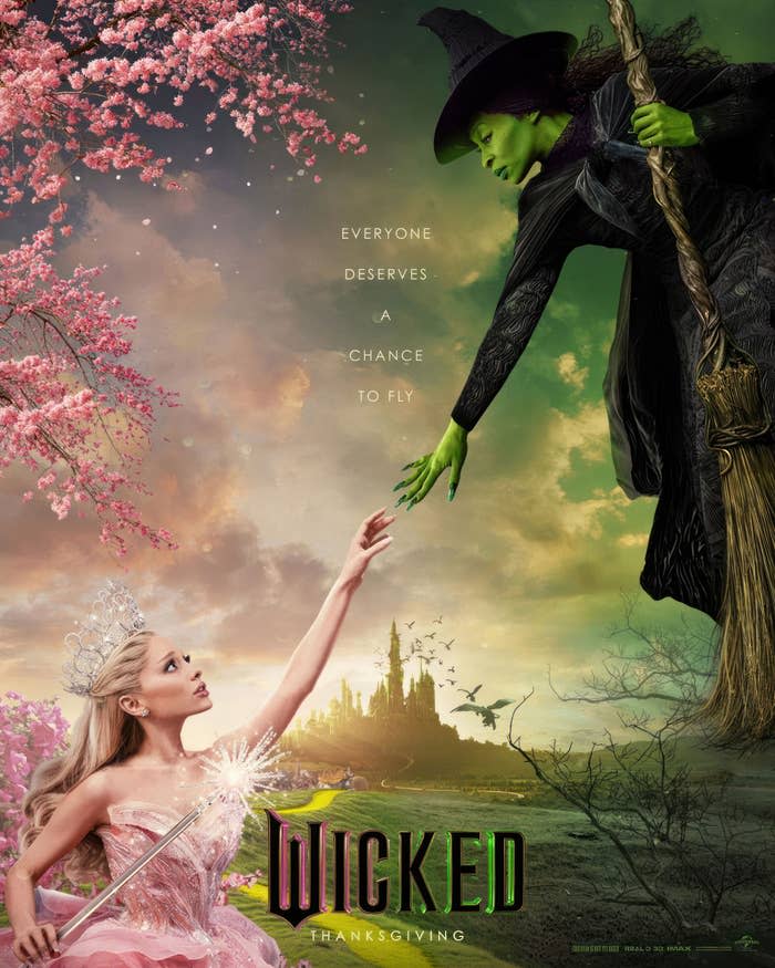 Poster for the musical "Wicked" featuring Glinda the Good Witch in a pink gown and Elphaba, the Wicked Witch of the West, on a broom. The text says: "Everyone Deserves a Chance to Fly"