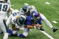 Philadelphia Eagles' Duke Riley (50) and Rodney McLeod (23) tackle New York Giants quarterback Daniel Jones (8) during the first half of an NFL football game Sunday, Nov. 15, 2020, in East Rutherford, N.J. (AP Photo/Corey Sipkin)