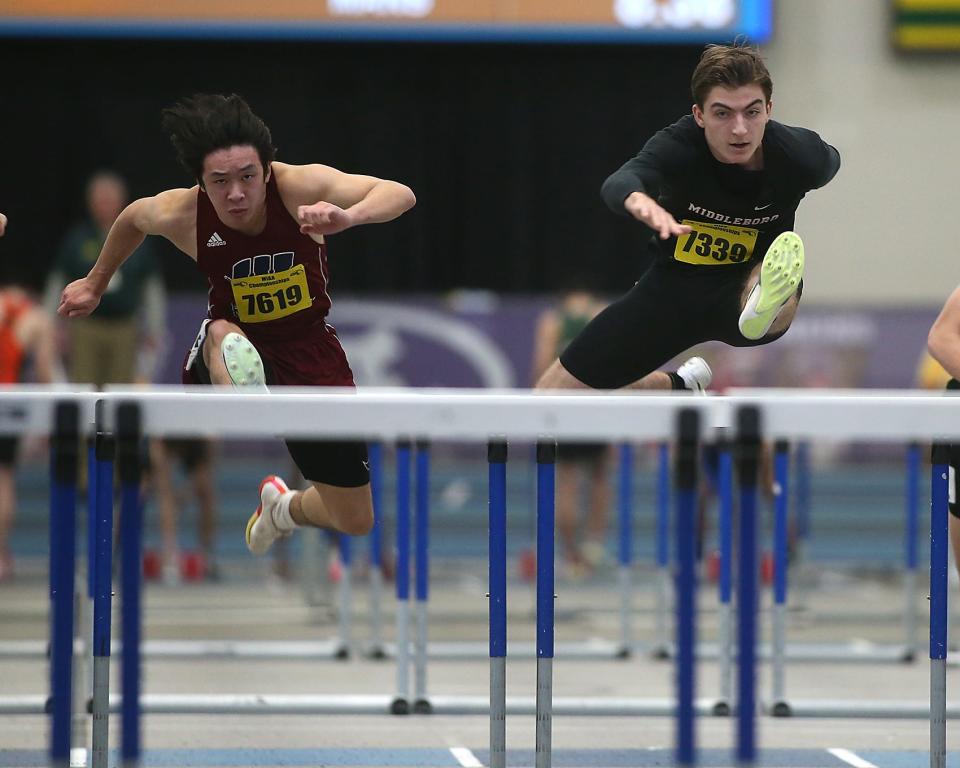 Middleborough’s Charles Montross leaps over a hurdle during the preliminary rounds of the 55 meter hurdles at the MIAA Meet of Champions at the Reggie Lewis Track Center in Boston on Saturday, Feb. 25, 2023.
