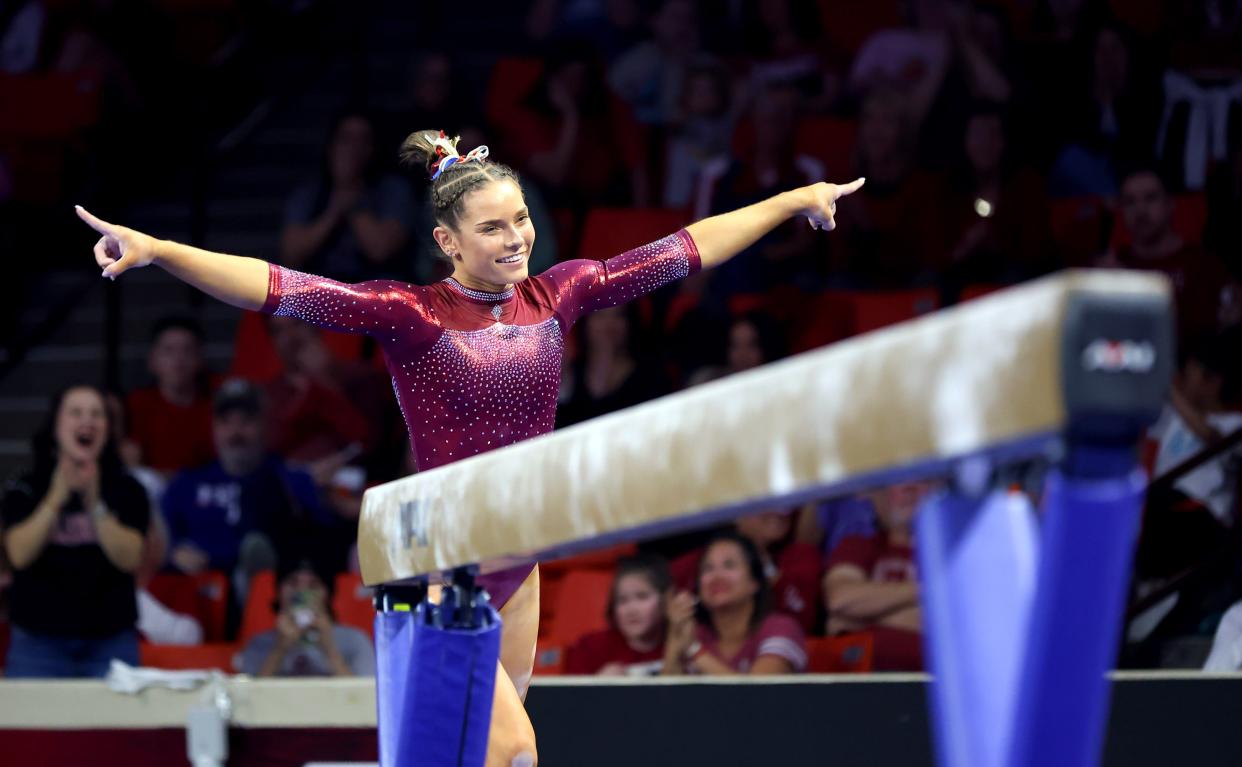 OU's Jordan Bowers celebrates following the beam during the Big 12 women's gymnastics championship at the Lloyd Noble Center in Norman on March 23.