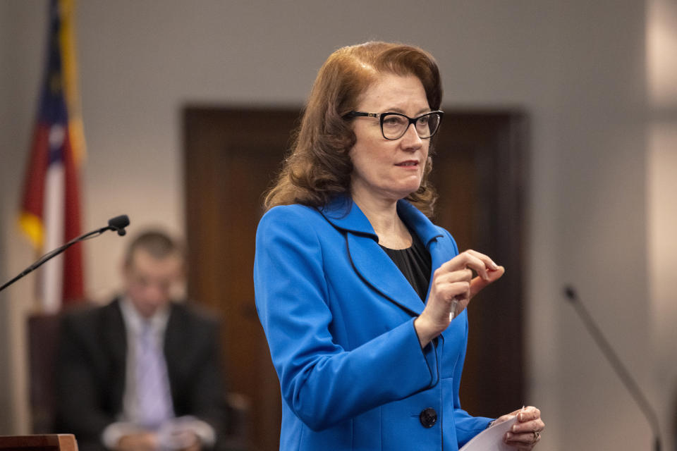 Prosecutor Linda Dunikoski argues a point during the trial of Greg McMichael and his son, Travis McMichael, and a neighbor, William "Roddie" Bryan in the Glynn County Courthouse, Tuesday, Nov. 9, 2021, in Brunswick, Ga. The three are charged with the February 2020 slaying of 25-year-old Ahmaud Arbery. (AP Photo/Stephen B. Morton, Pool)