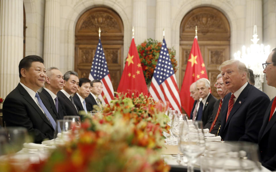 FILE - In this Dec. 1, 2018, file photo President Donald Trump speaks as China's President Xi Jinping listens during their bilateral meeting at the G20 Summit in Buenos Aires, Argentina. Trump meets with President Xi Jinping at the G-20 meeting in Japan this week. (AP Photo/Pablo Martinez Monsivais, File)