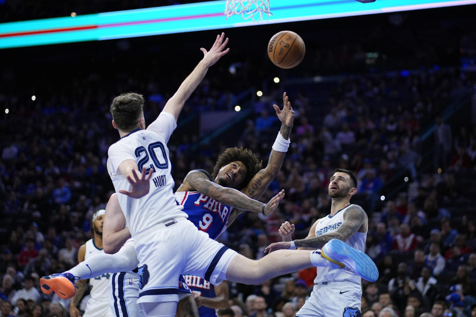 Philadelphia 76ers' Kelly Oubre Jr. (9) goes up for a shot against Memphis Grizzlies' Matt Hurt (20) during the first half of an NBA basketball game, Wednesday, March 6, 2024, in Philadelphia. (AP Photo/Matt Slocum)