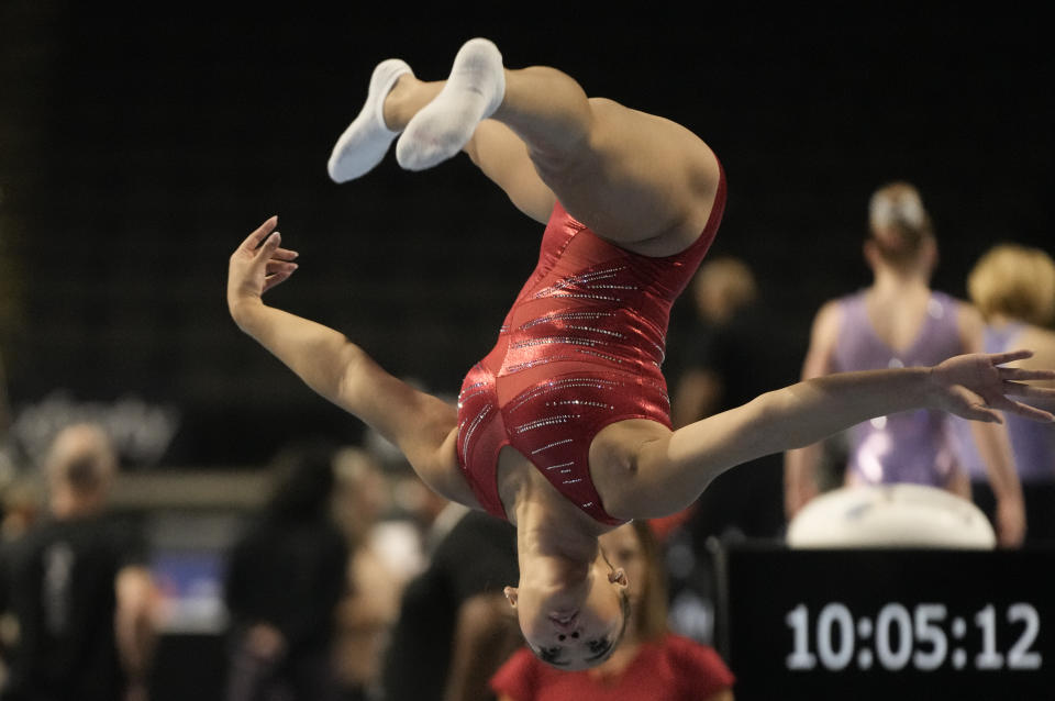 Suni Lee practices on the floor exercise at the U.S. Classic gymnastics competition Friday, Aug. 4, 2023, in Hoffman Estates, Ill. (AP Photo/Morry Gash)