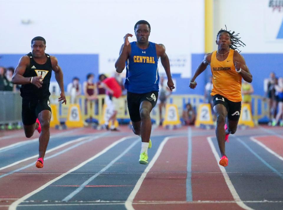 Sussex Central's Timothy Wright (center) takes first place in the 55 meter dash ahead of Tatnall's Rahshan LaMons (left, third place) and second-place finisher Jasyn Truitt of Salesianum during the DIAA state high school indoor track and field championships at Prince George's Sports and Learning Complex in Landover, Md., Saturday, Feb. 4, 2023.