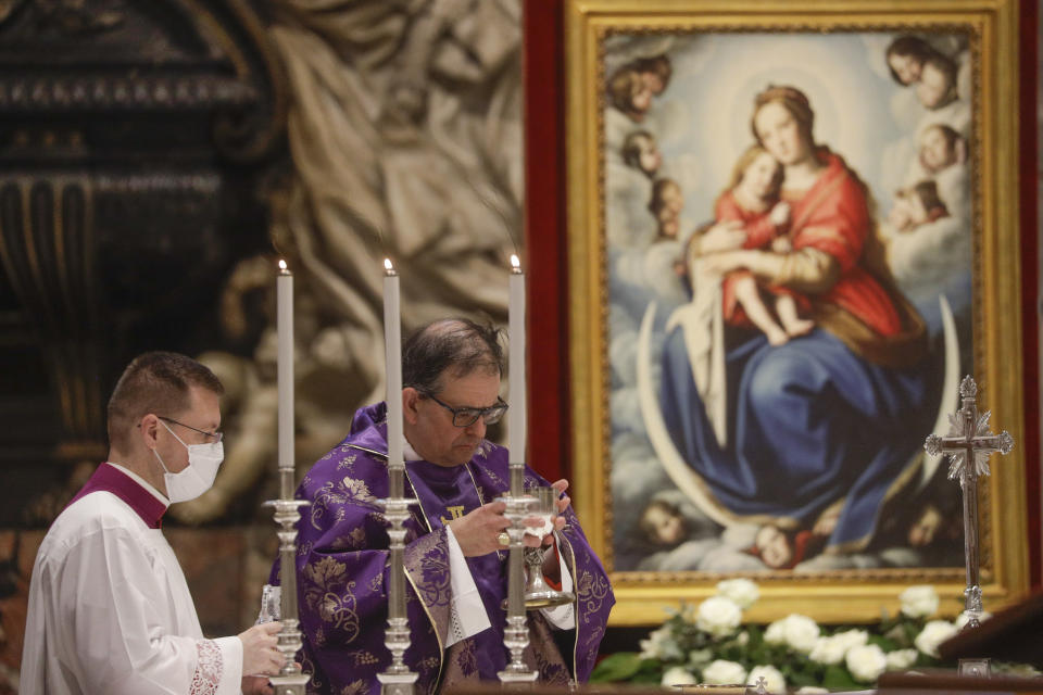 Cardinal Augusto Paolo Lojudice attends a Mass celebrated by Pope Francis the day after the pontiff raised 13 new cardinals to the highest rank in the Catholic hierarchy, at St. Peter's Basilica, Sunday, Nov. 29, 2020. (AP Photo/Gregorio Borgia, Pool)