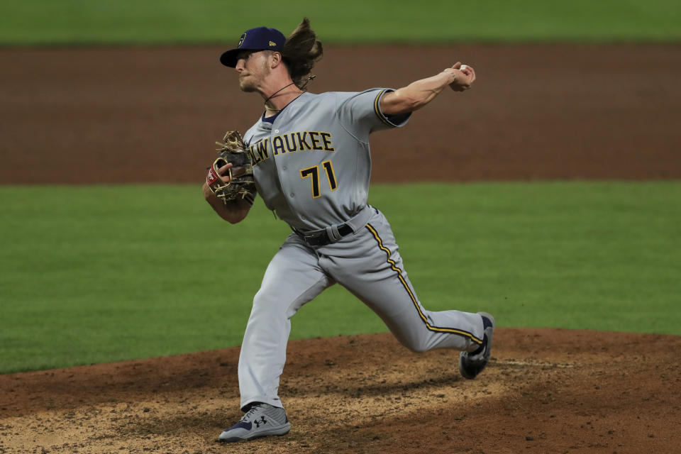 Milwaukee Brewers' Josh Hader throws in the ninth inning during a baseball game against the Cincinnati Reds in Cincinnati, Tuesday, Sept. 22, 2020. (AP Photo/Aaron Doster)