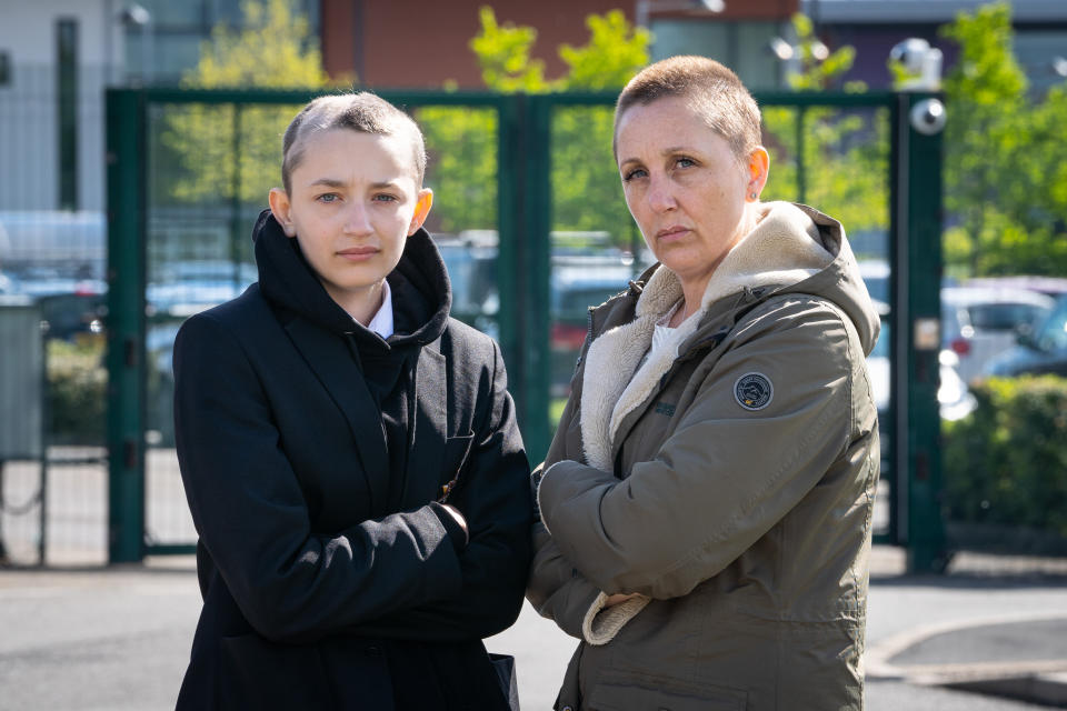 Ella Goodwin, 13 and Joanne Davies, 41, outside Heritage High School, Clowne, Derbyshire. (SWNS)