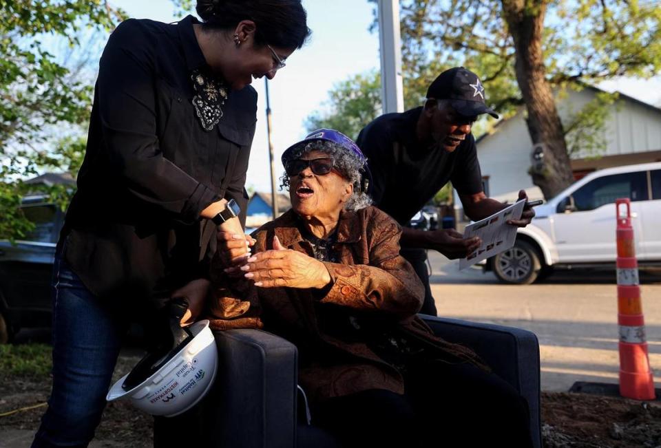 Opal Lee is surrounded by well-wishers as she sits in an armchair adjacent to the slab that will become her new home on Annie Street in Fort Worth on Thursday, March 21, 2024.