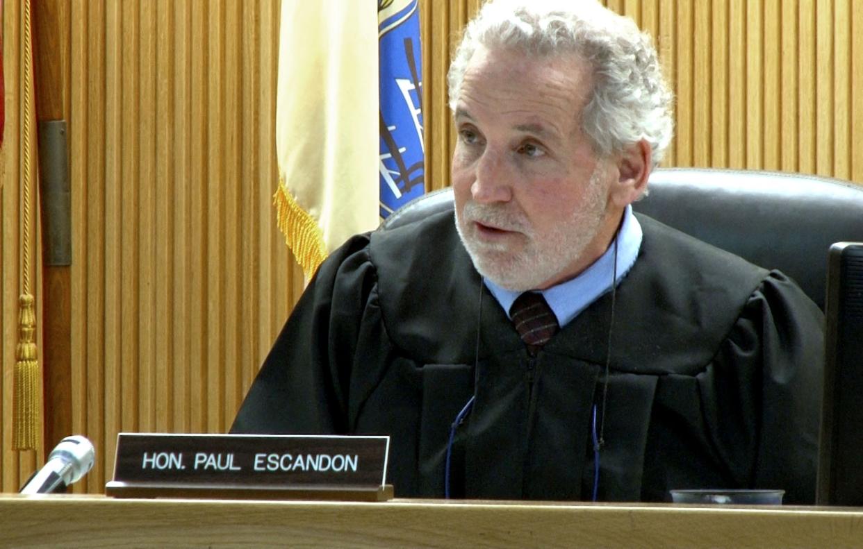 Superior Court Judge Paul X. Escandon preside over the detention hearing for Thomas R. Carraher, a Tinton Falls elementary school teacher accused of trying to solicit sex from a minor. The hearing was held in Freehold Monday, January 29, 2024.