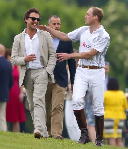 <p>Max Mumby/Indigo/Getty Images</p> Thomas van Straubenzee with Prince William, at Cowarth Park Polo Club, on May 31, 2014