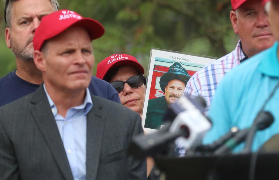 Members and supporters of 9/11 Justice.org held a gathering outside the Clarence Dillon Library in Bedminster to address the media concerning their opposition to Saudi support for the LIV Golf Tournament being held at Trump National in Bedminster, NJ on July 29, 2022.