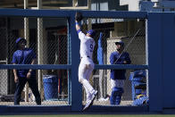 Los Angeles Dodgers left fielder Gavin Lux can't get to a ball hit for an RBI double by San Diego Padres' Luke Voit during the ninth inning of a baseball game Sunday, July 3, 2022, in Los Angeles. (AP Photo/Mark J. Terrill)