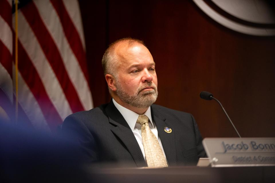 Ottawa County Commissioner Jacob Bonnema listens during public comment Tuesday, Jan. 24.