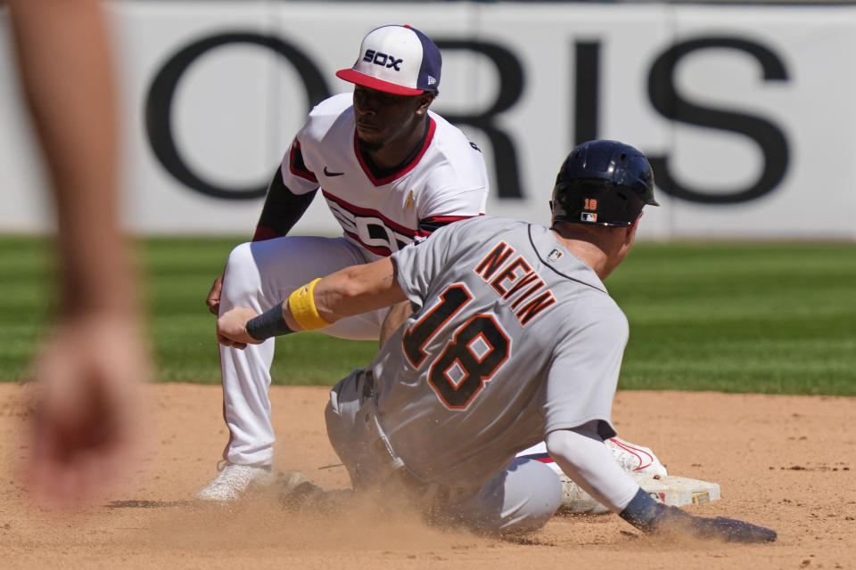 Chicago White Sox shortstop Tim Anderson, left, tags out Detroit Tigers' Tyler Nevin during the fourth inning of a baseball game in Chicago, Sunday, Sept. 3, 2023. (AP Photo/Nam Y. Huh)