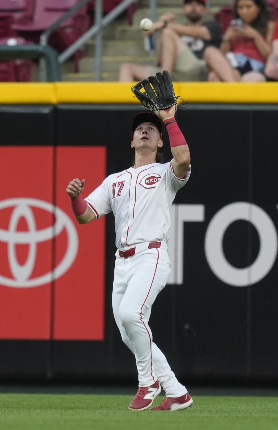 Cincinnati Reds outfielder Stuart Fairchild catches a ball hit by San Diego Padres' Donovan Solano during the seventh inning of a baseball game Tuesday, May 21, 2024, in Cincinnati. (AP Photo/Carolyn Kaster)